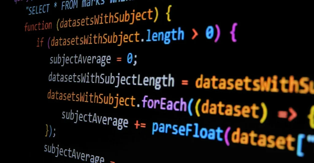 Code JavaScript coloré sur un écran sombre, illustration d'un guide pour apprendre JavaScript